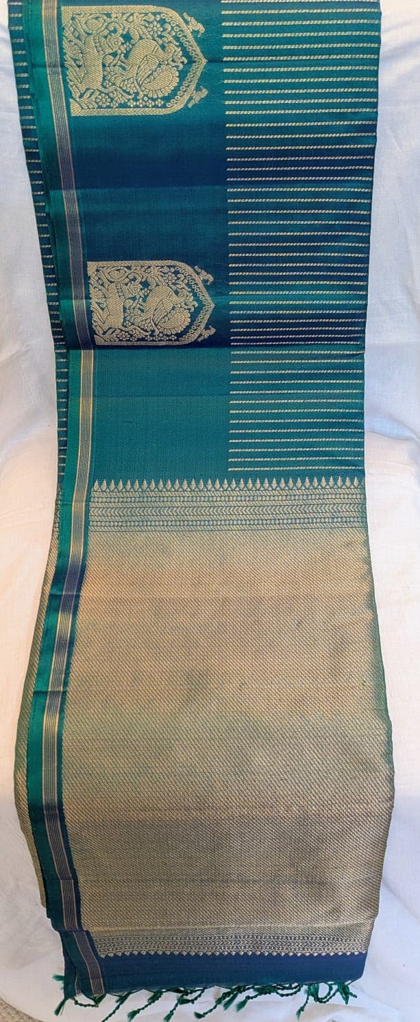 Pure kanchi silk saree- Green colour self border and zari pallu